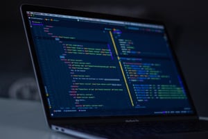 Code on a monitor representing AI agent debugging Power Automate flows — Photo by Florian Olivo on Unsplash